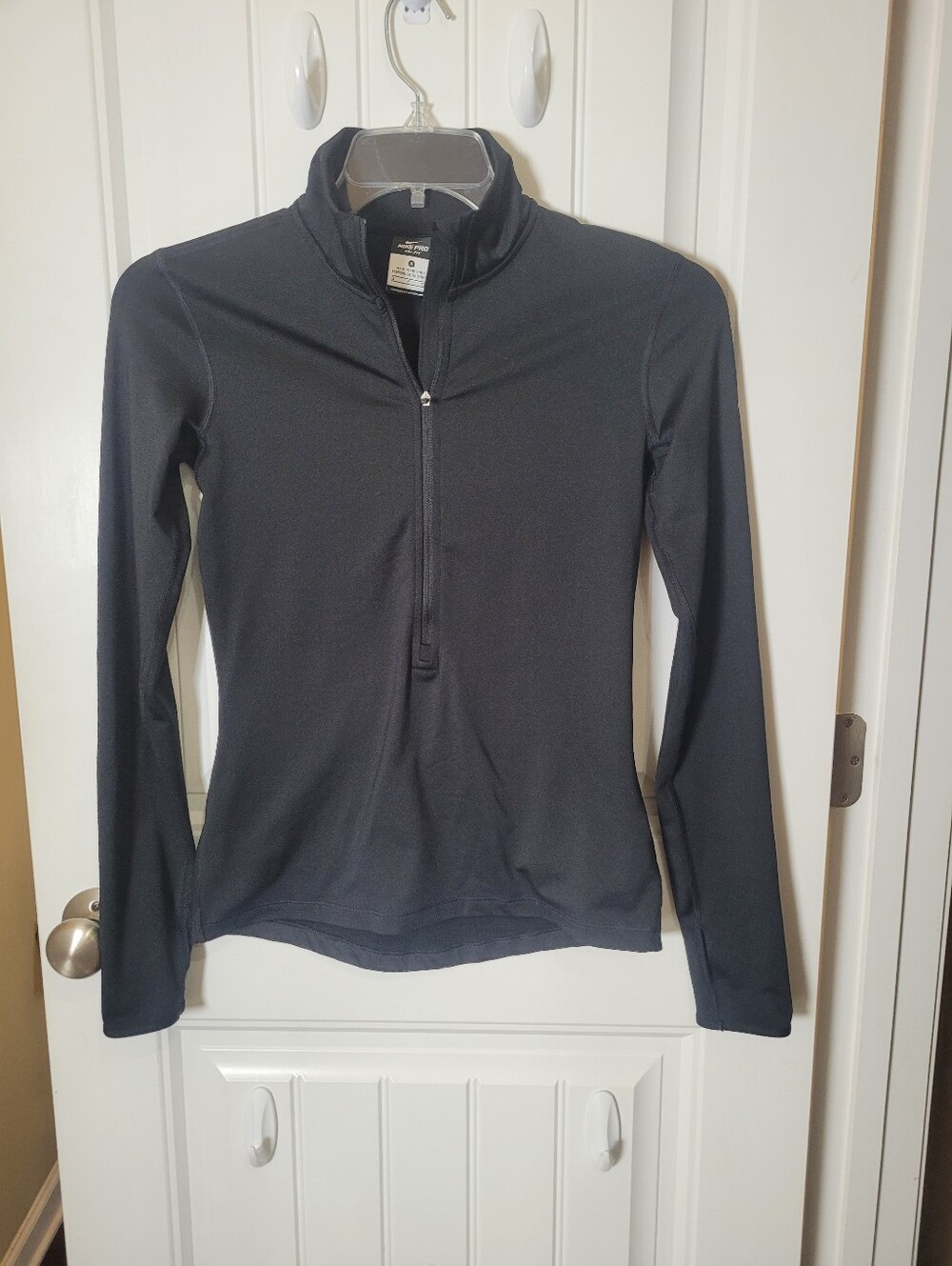 Nike Pro Women's Black half-zip jacket. Size Small